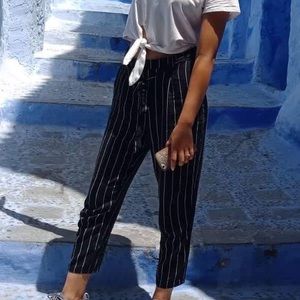 Waist tapered pants